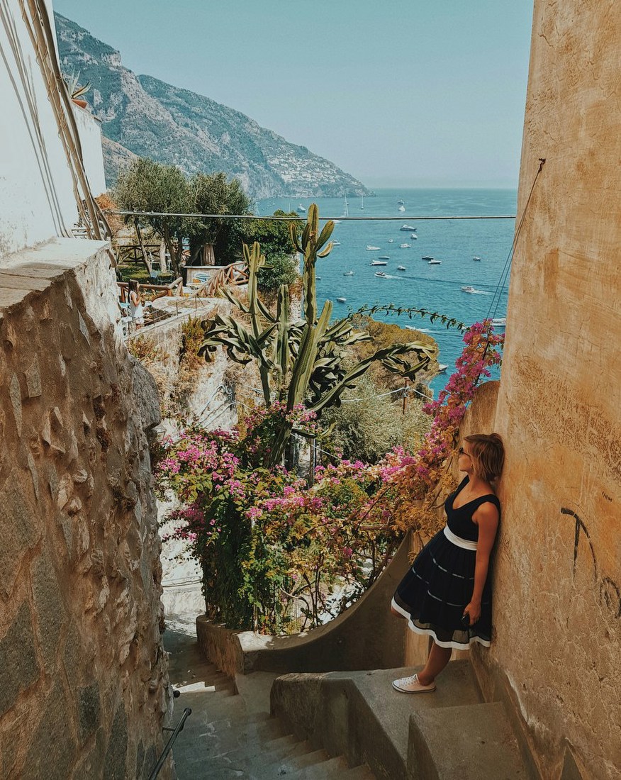 Woman Overlooking Coastal View