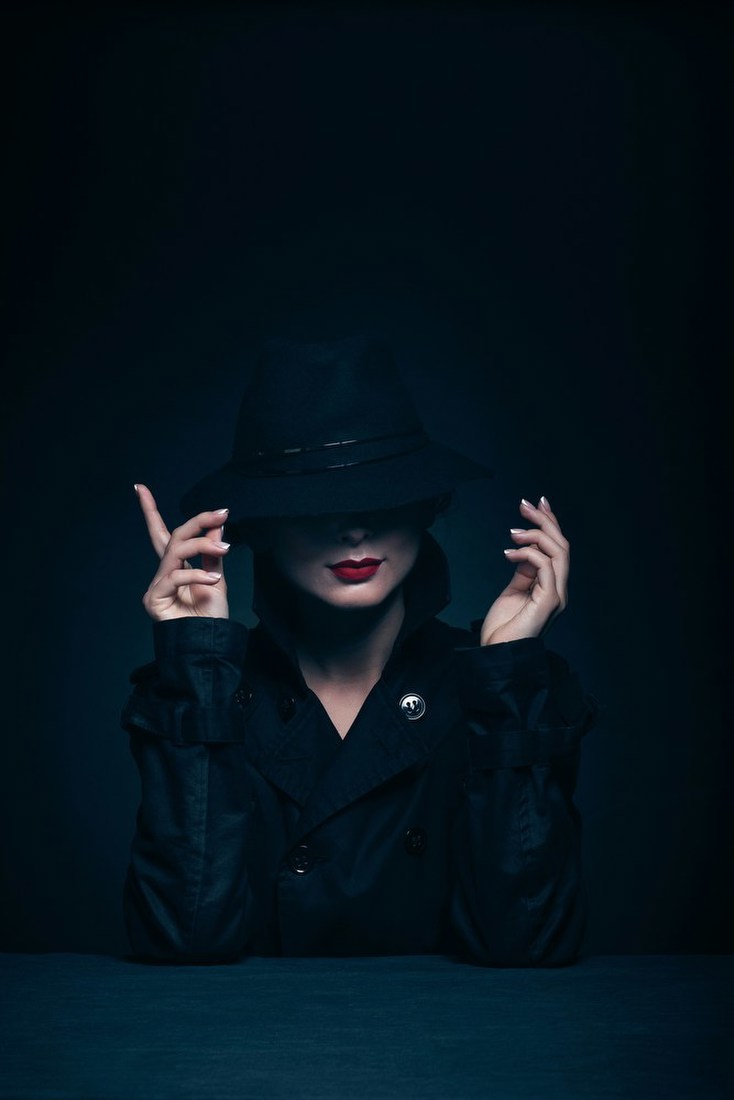 Mysterious Figure in Hat