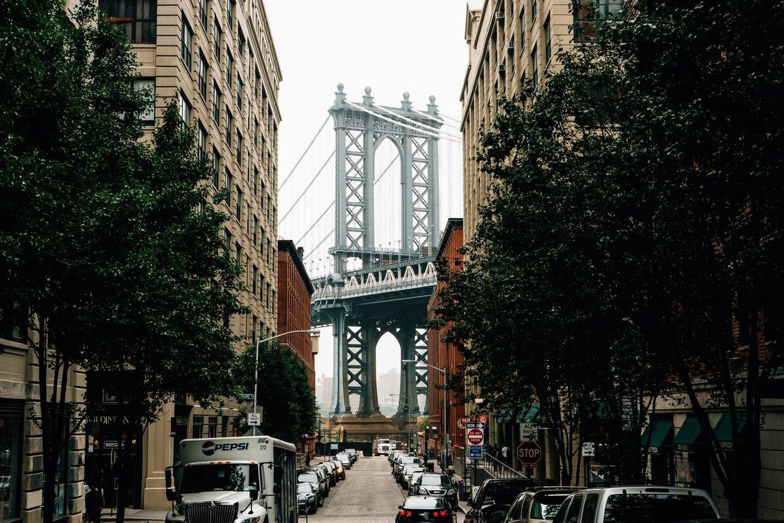 Bridge Framed by City Street
