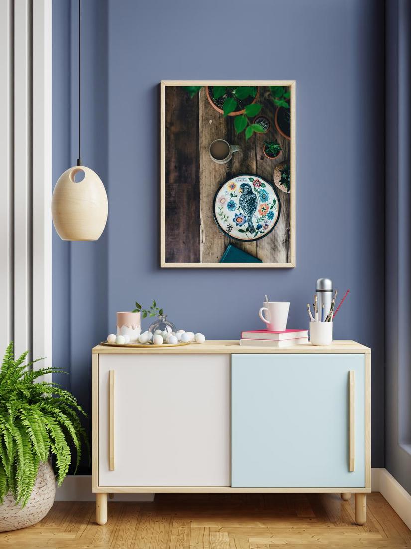 Decorative Bird Plate on Wooden Table