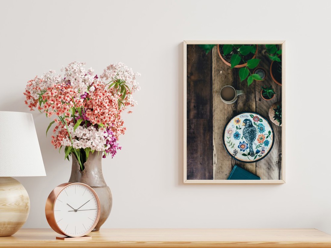 Decorative Bird Plate on Wooden Table