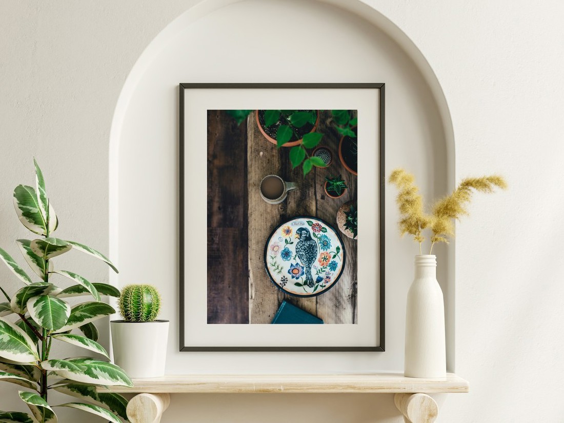 Decorative Bird Plate on Wooden Table