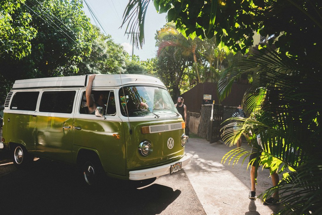 Green VW Van in Tropical Drive